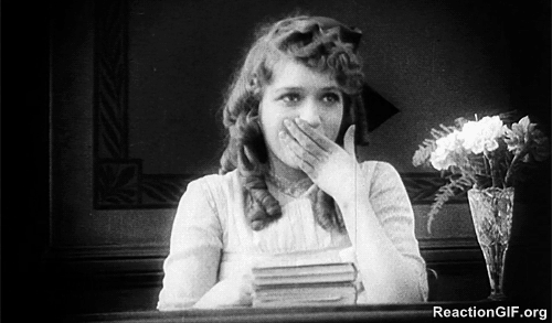 GIF-Amused-amusement-black-and-white-giggle-laugh-vintage-GIF
